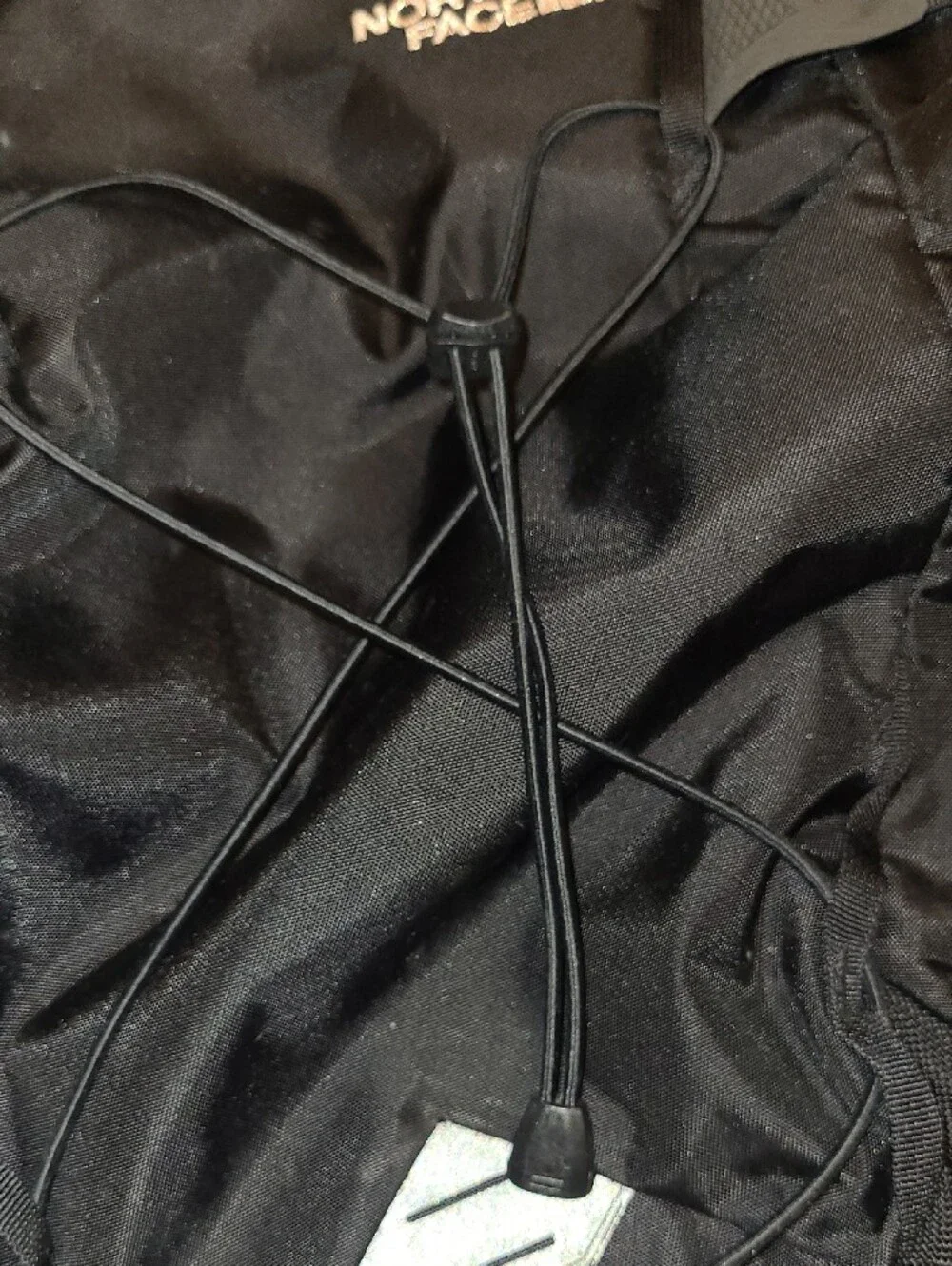 The North Face Black Solid State Backpack With Rose Gold Logo